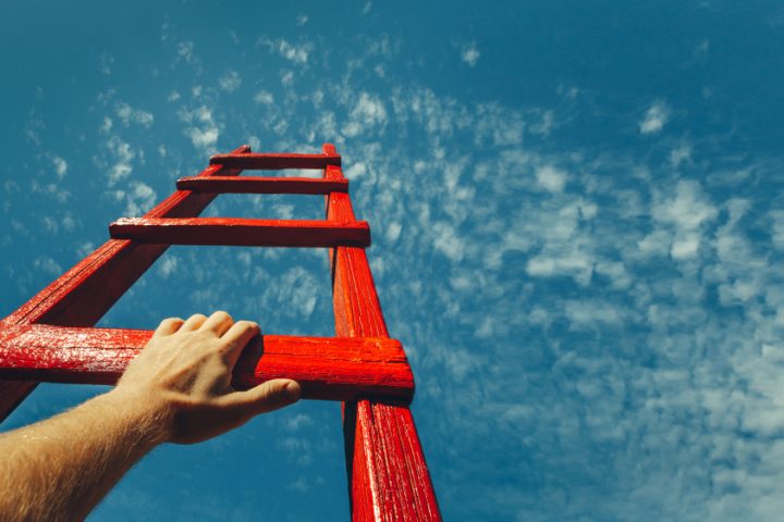 Person Climbing Stairs of Personal Growth